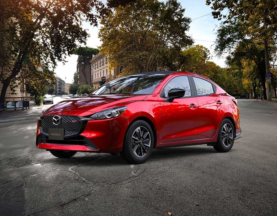 https://www.mazda.mx/siteassets/mazda-mx/mycos-2024/mazda2-sedan/vlp/experiencia-signature/auto-mazda2-sedan-rojo-parque-v1.jpg