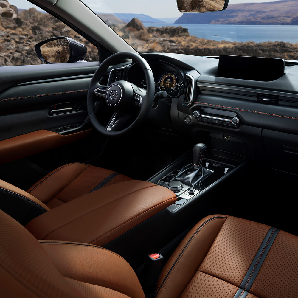 Mazda cx50 interior asientos condcutor terracota v1